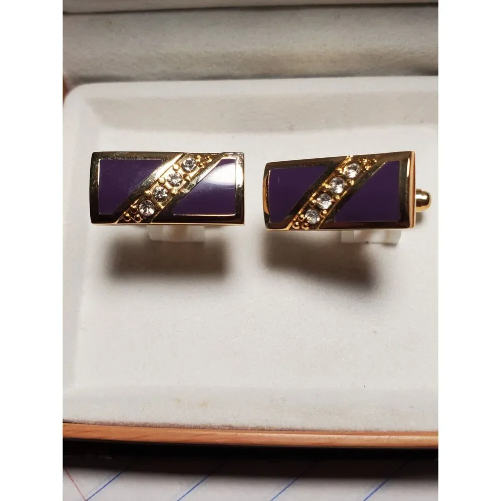 The Cufflinks are gold-toned with purple inlay Great Gift